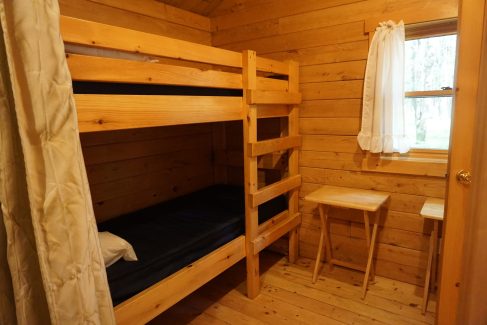 bunks in cabin with bathroom