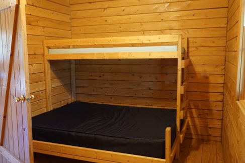 large log cabin bunks